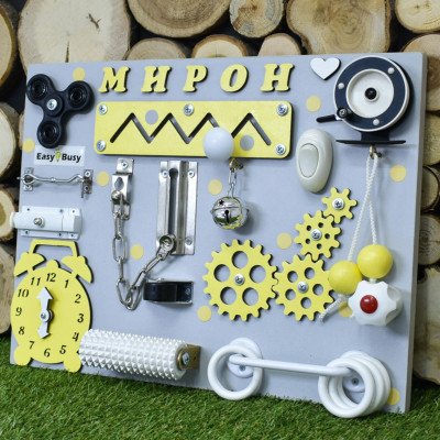 Busy Board жовтий з котушкою | Сенсорна дошка Montessori 30×40 з шестернями, спінером та замками